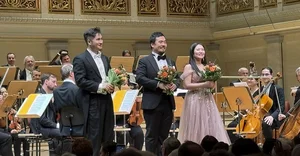 Künstler vor Orchester